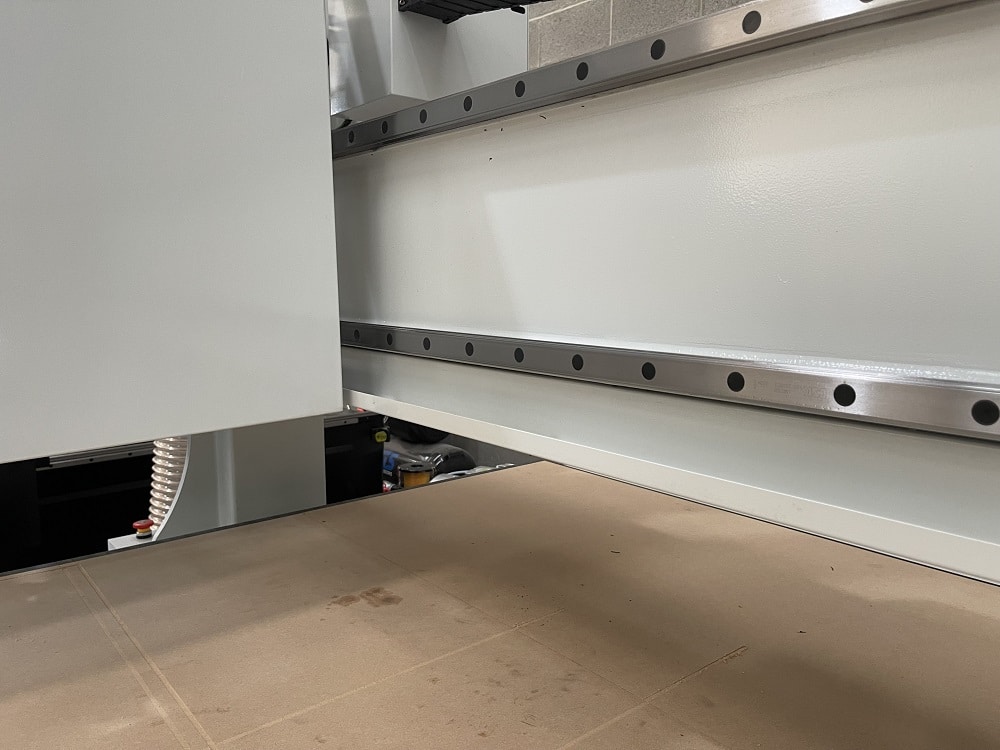 Oil Drip Tray The Pegasus ATC CNC routers include automatic lubrication, as mentioned right. The oil drip tray collects excessive lubricant, preventing oil from dripping onto materials situated on the bed.